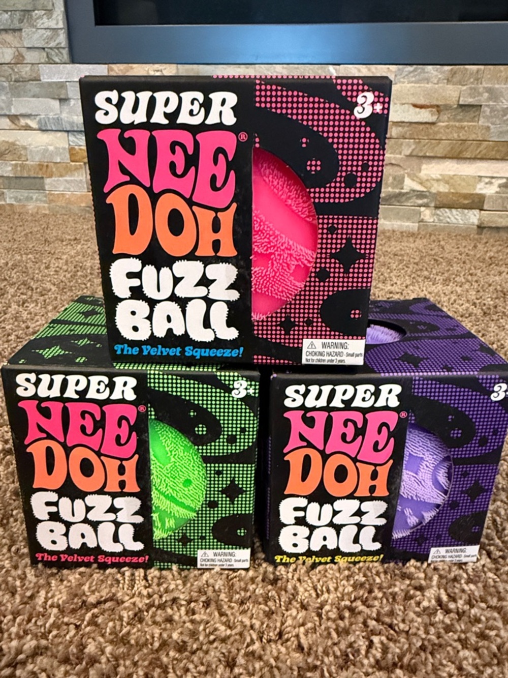 Lot of three SUPER NeeDoh Fuzz Ball Plush Stress Toy - Pink, Green, and Purple